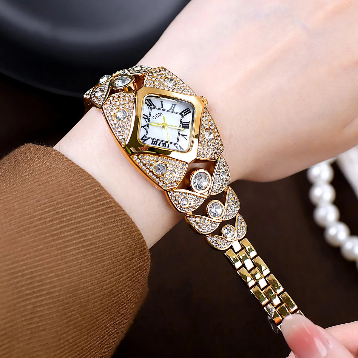 Silver and blue luxury women's watch from 2026 by Corporación Turística, featuring a sleek bracelet design and elegant style.