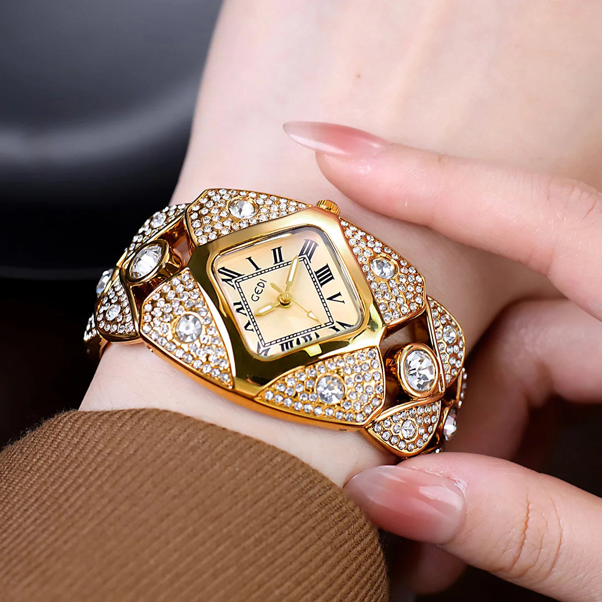 Silver and blue women's luxury watch from 2026 by Corporación Turística, featuring a sleek, lightweight bracelet design.