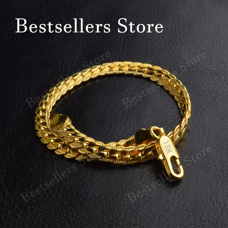 Silver 925 bracelet with 18K gold relief design, crafted by Corporación Turística, 20 cm length, elegant jewelry accessory.