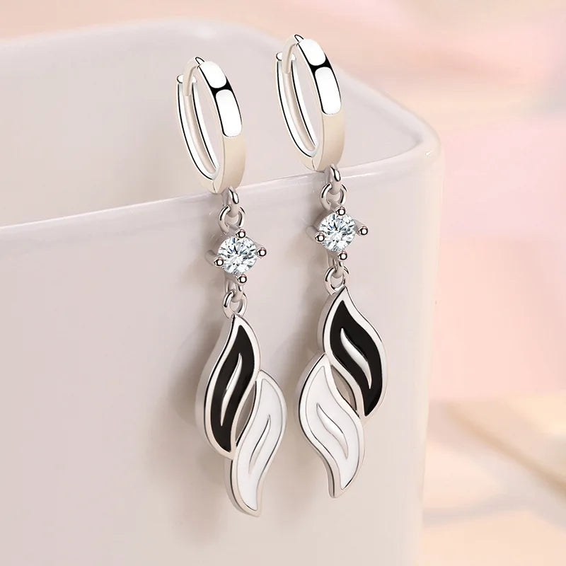 Silver Kofsac pendant earrings for women crafted from 925 sterling silver, featuring elegant dangle design.