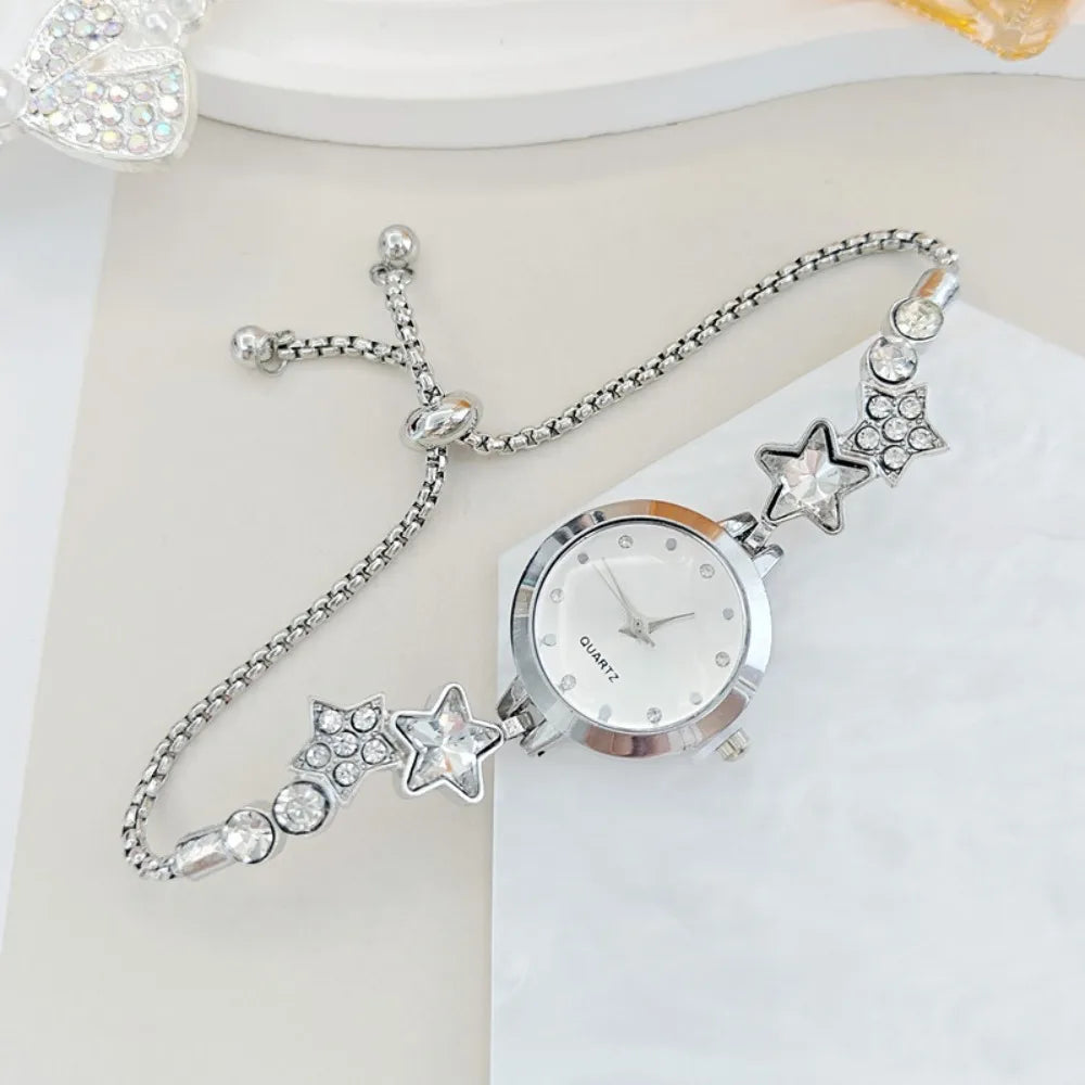 Silver adjustable bracelet watch with sparkling rhinestones, elegant design by Corporación Turística.