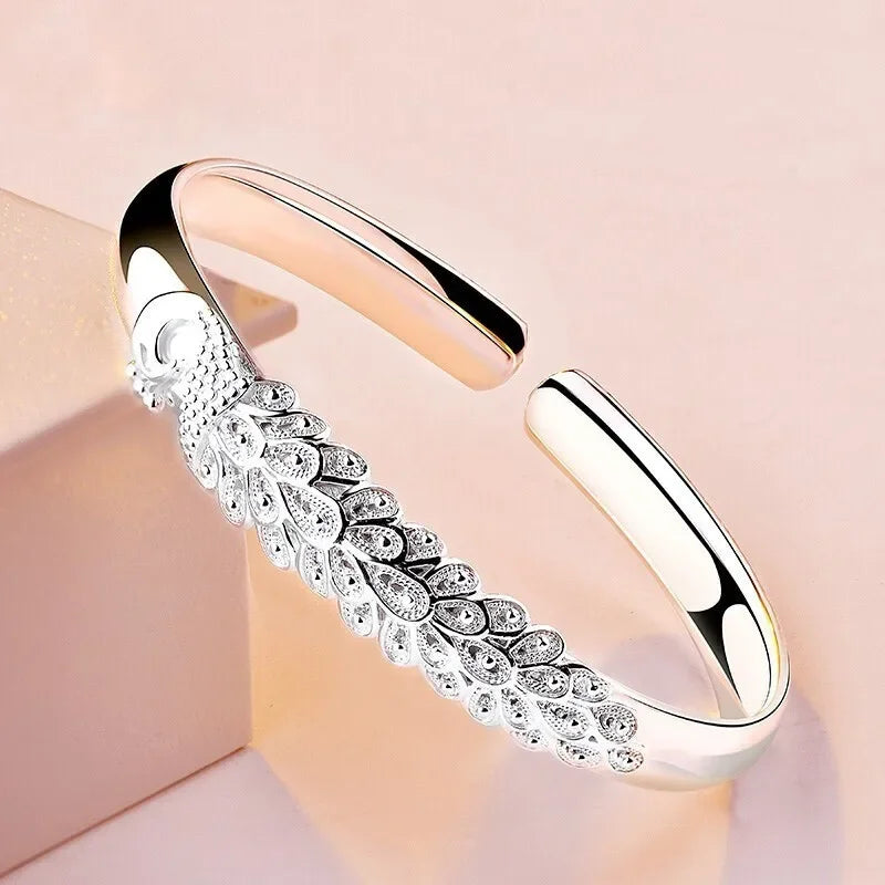 Sterling silver 925 bracelet with openable display from Corporación Turística, featuring a sleek, polished design.