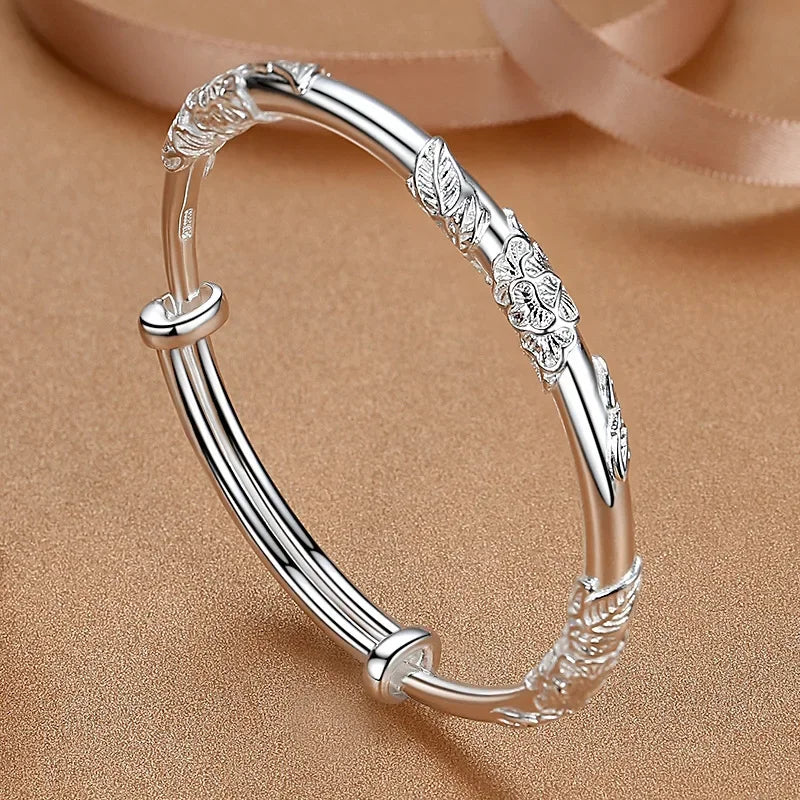Sterling silver 925 bracelet with open display, featuring intricate design, from Corporación Turística.