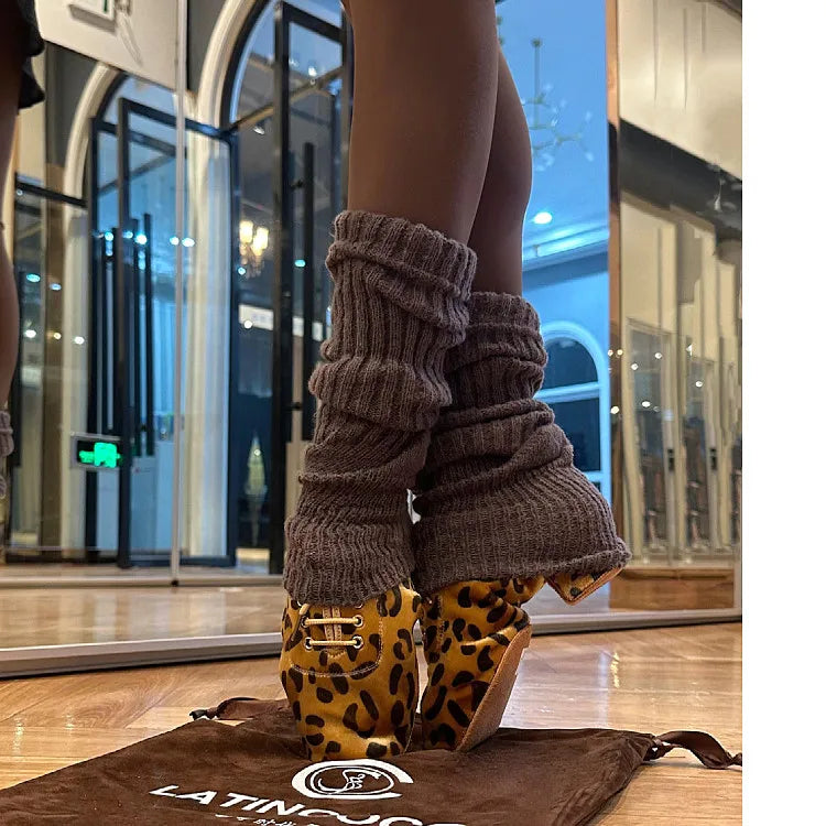 Elegant SW Latin Dance professional shoes by Corporación Turística, featuring sleek design and polished finish for stylish performances.