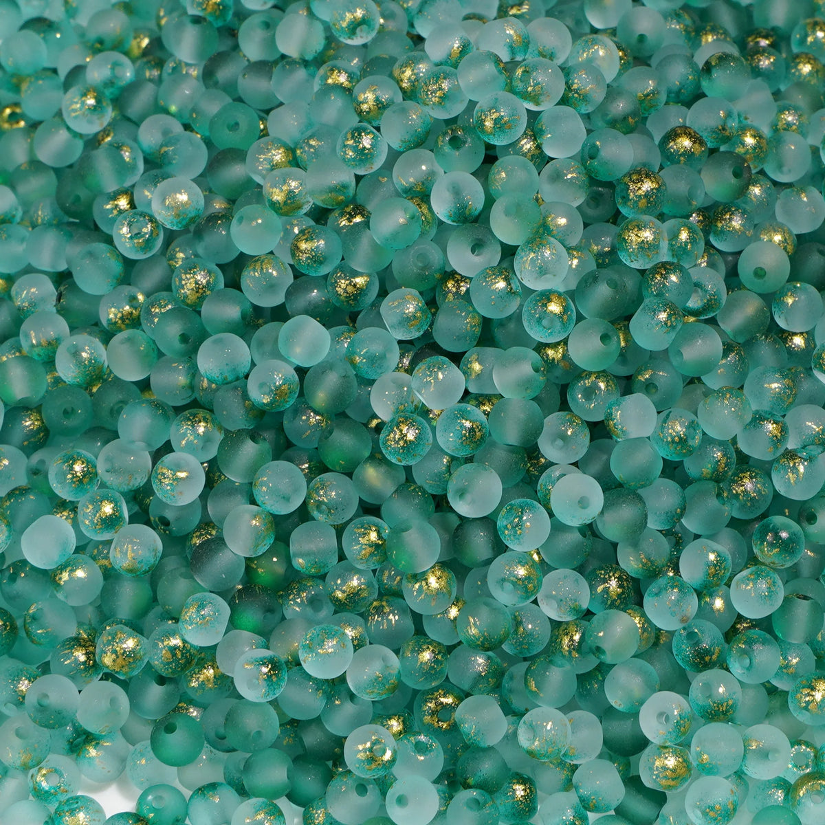 Set of 100 gold-splashed glass rice beads from Corporación Turística, small 4mm colorful jewelry-making supplies.