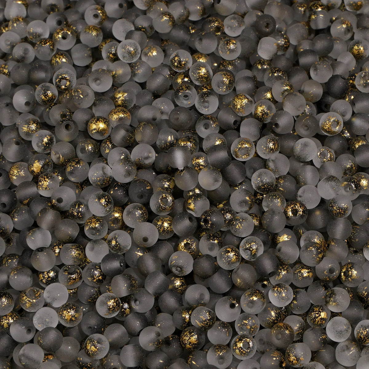 Set of 100 gold-splashed glass rice beads from Corporación Turística, 4mm size, ideal for jewelry making and crafts.