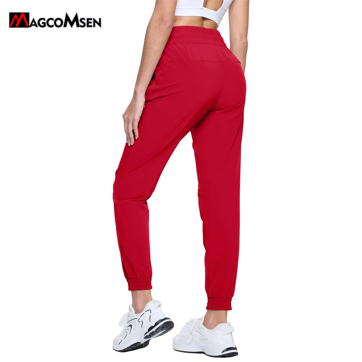 Magcomsen waterproof hiking pants for women in tomato red, designed for outdoor trekking and weather protection.