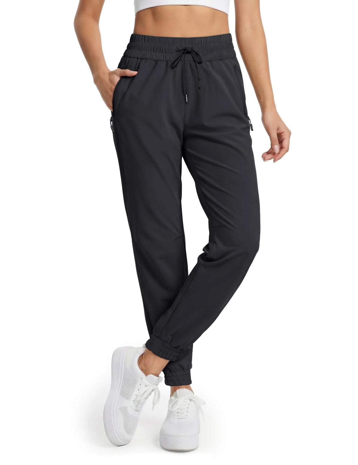 Magcomsen waterproof hiking pants for women in vibrant tomato red, designed for outdoor adventures and outdoor activity comfort.