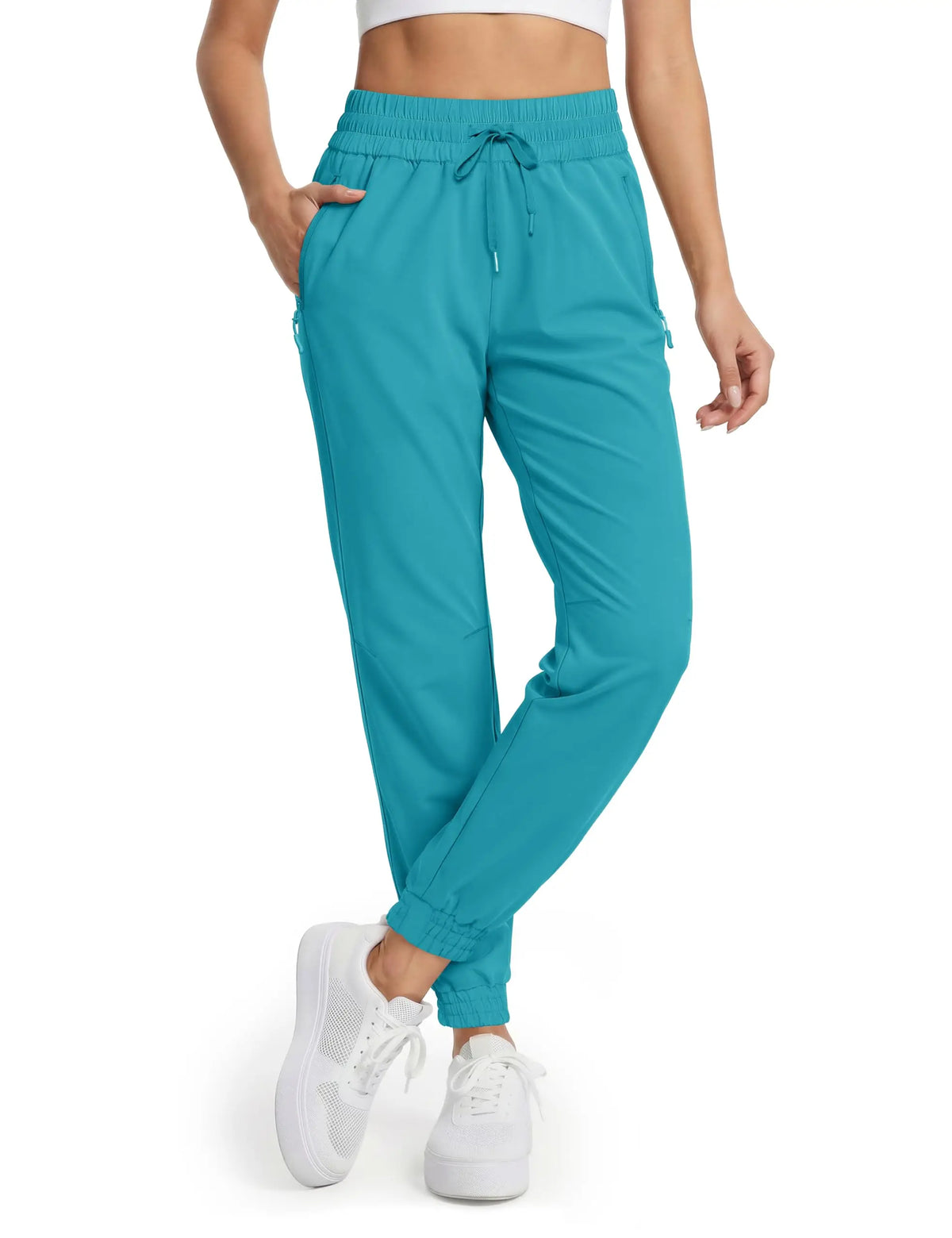 Magcomsen waterproof hiking pants for women in vibrant red, designed for outdoor trekking and outdoor activities.
