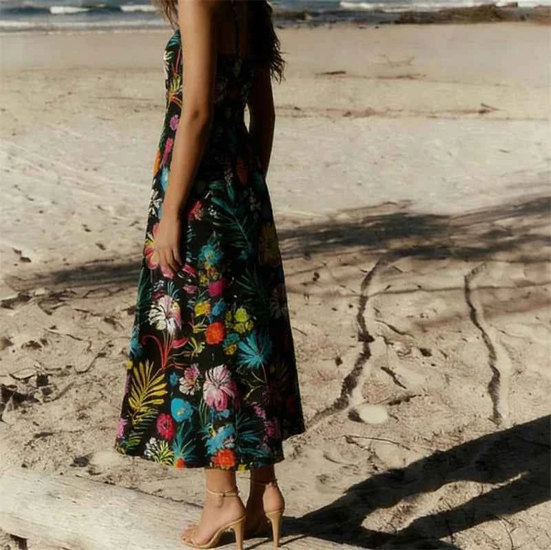 Elegant long floral evening dress for women by Corporación Turística, featuring a vibrant turquoise print for special occasions.