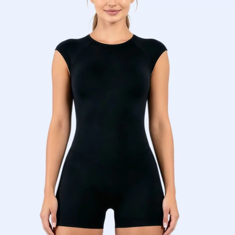 Histello women's short-sleeve mono deportivo body in ultra violet by Corporación Turística, sleek athletic one-piece for active wear.