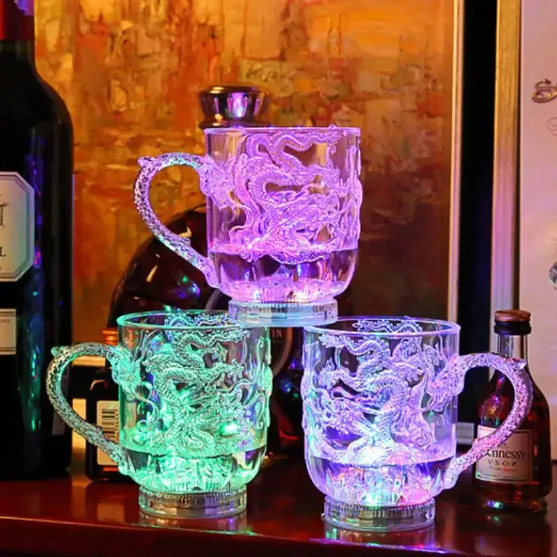 Color-changing LED dragon mug by Corporación Turística, illuminated by water, perfect for parties and festive gatherings.