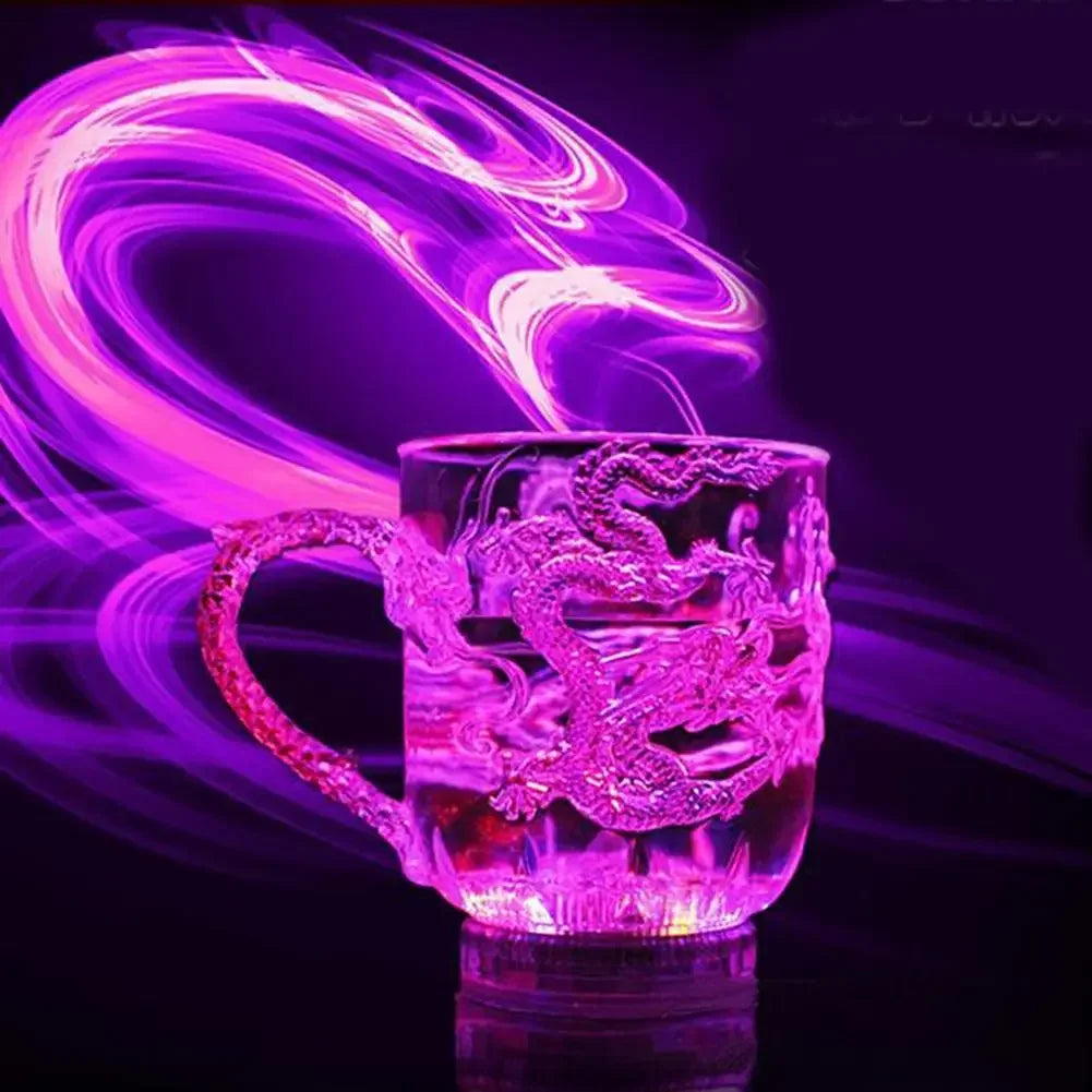 Color-changing LED dragon mug by Corporación Turística, transparent water-activated glow mug for parties and festive occasions.