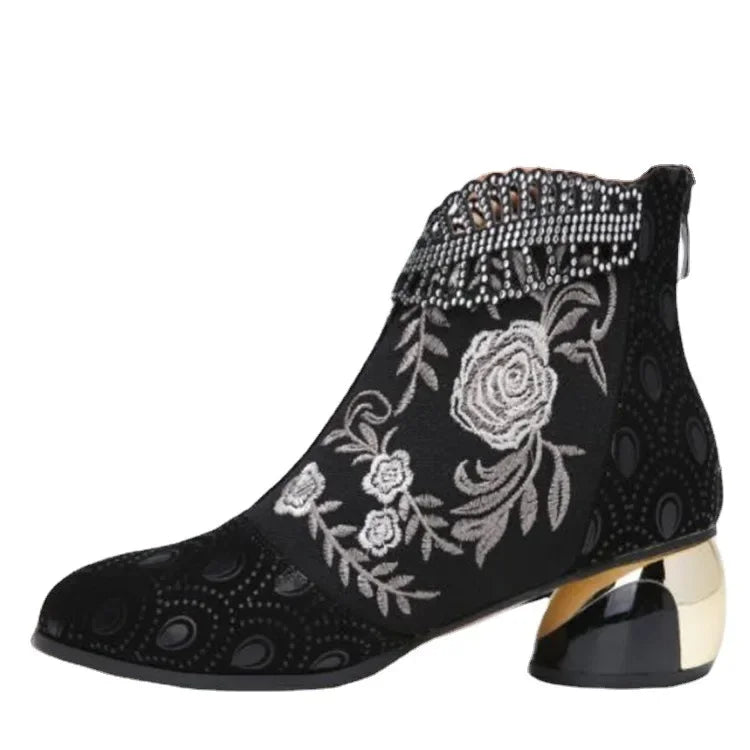 Green leather women's ankle boots with intricate embroidery, stylish botines by Corporación Turística in size 37.