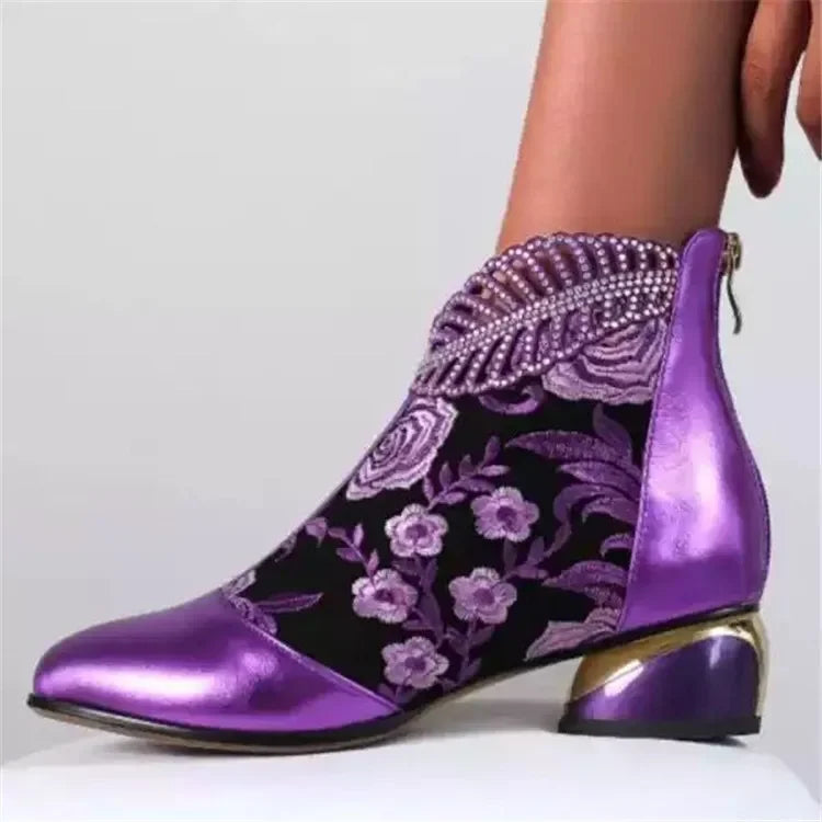 Leather embroidered women's ankle boots by Corporación Turística in green, featuring stylish design and detailed stitching.