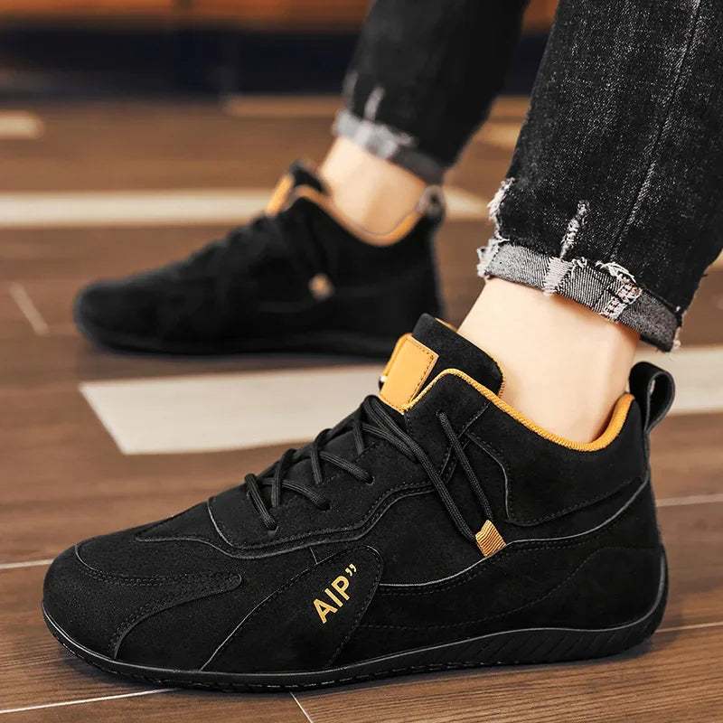 Black high-top casual men's moccasins and athletic shoes by Corporación Turística, showing stylish footwear with sporty design.