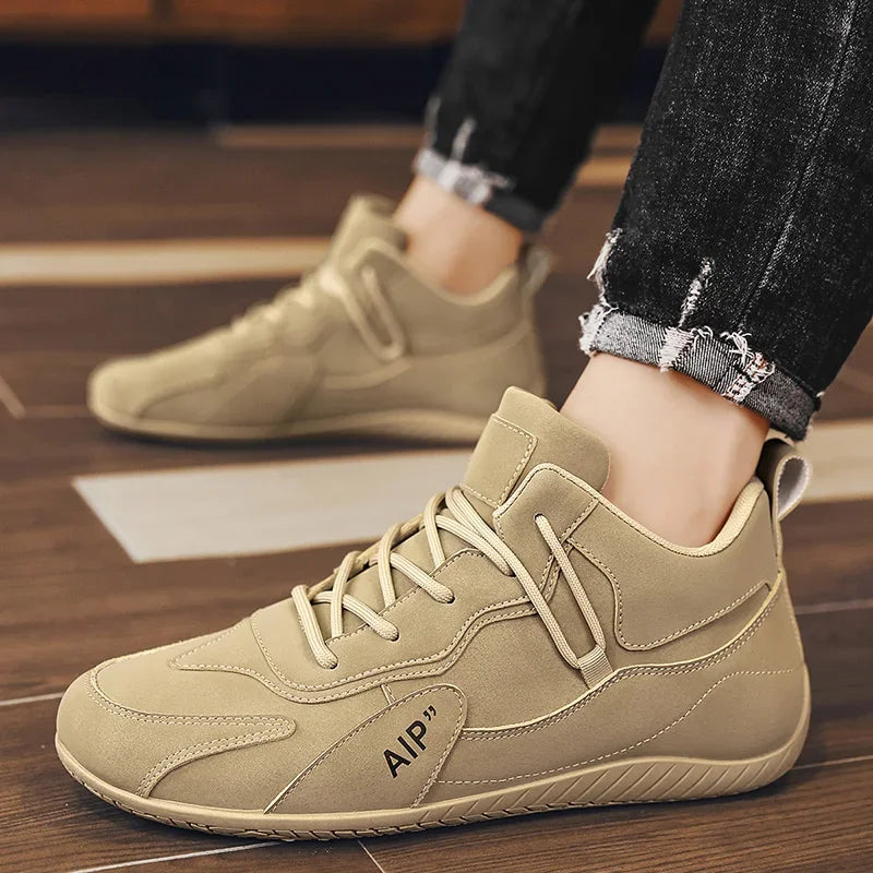 Black men's casual sports shoes, high-top moccasins by Corporación Turística, featuring a sleek design and comfortable fit.
