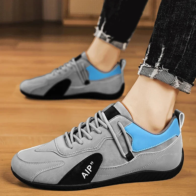 Black men's casual high-top moccasins and athletic shoes by Corporación Turística, showing the stylish, comfortable footwear design.