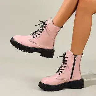 White women's high-quality leather ankle boots with a sleek design, perfect for stylish casual or formal wear.