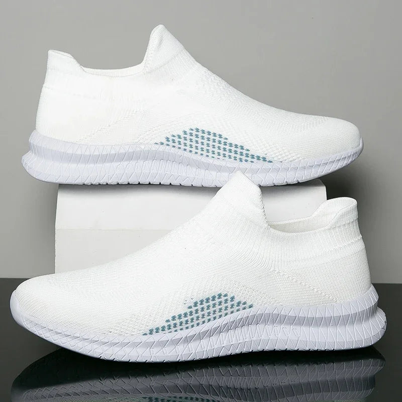 Lightweight men's walking shoes in white from Corporación Turística, featuring breathable design and comfortable fit for daily wear.