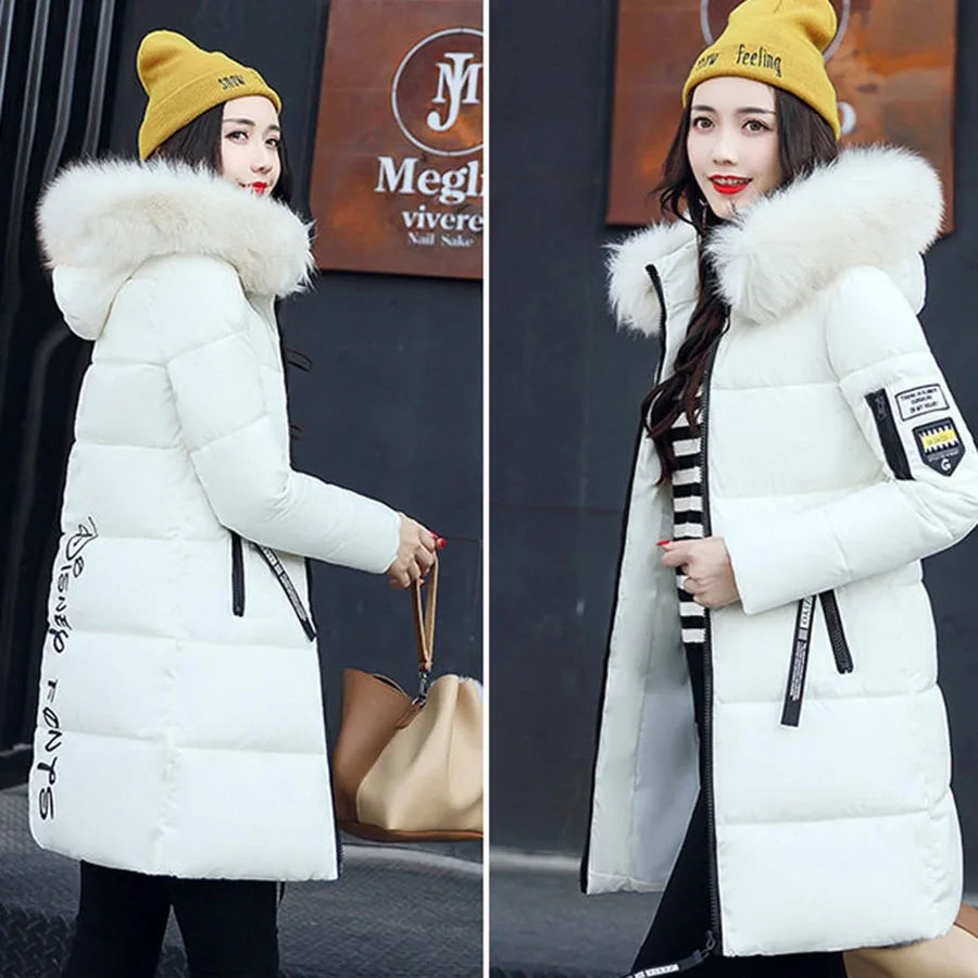 White women's winter parka coat with faux fur collar by Corporación Turística, featuring a warm, stylish design for cold weather.