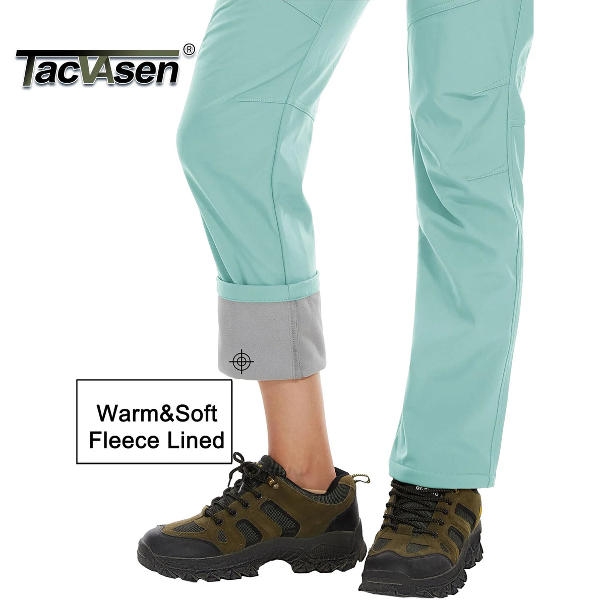 White women's winter waterproof pants by Tacvasen, featuring a snug fit and secure waterproof fabric for outdoor winter activities.