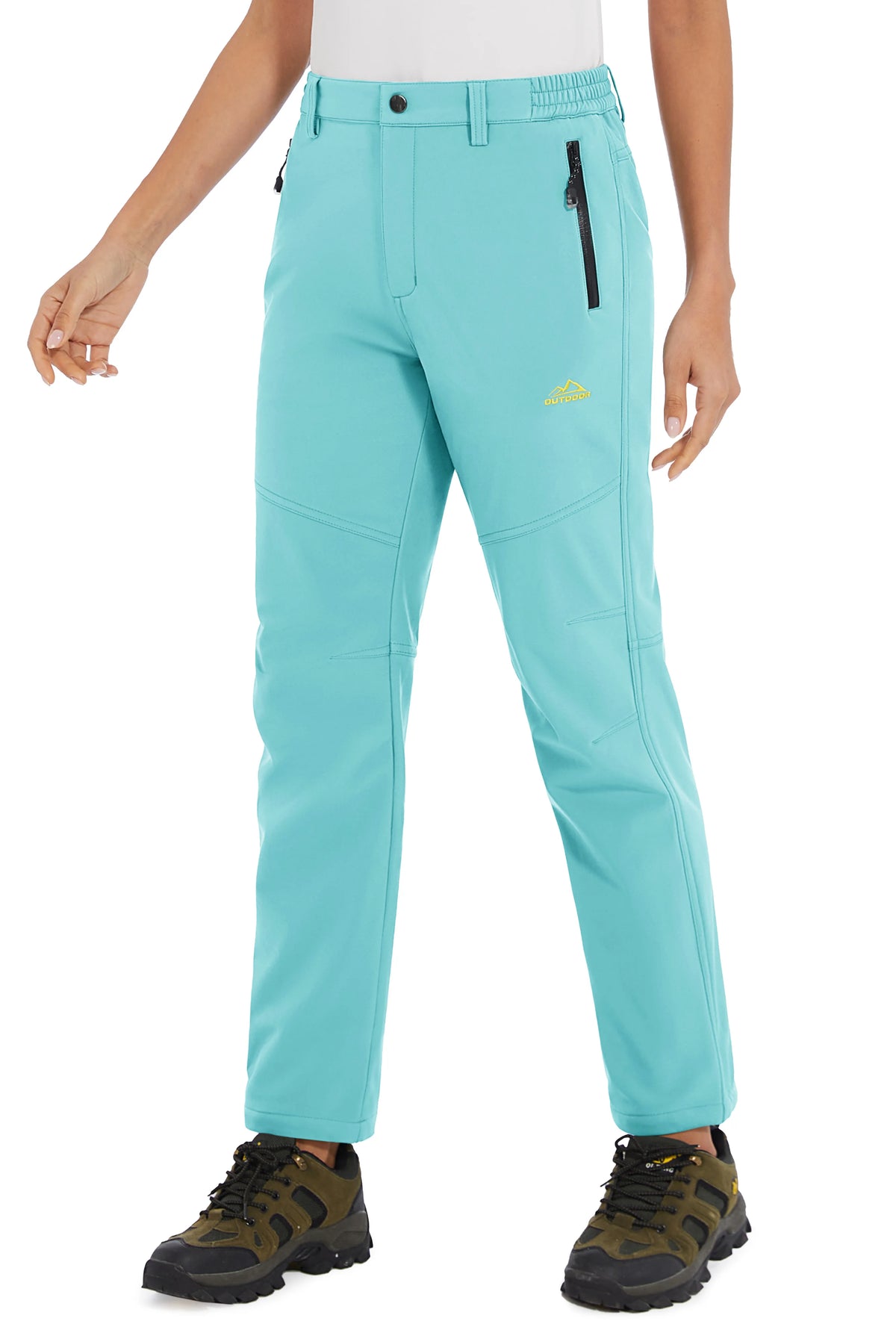 White women's waterproof winter pants by Tacvasen, designed for outdoor activities and cold weather conditions.