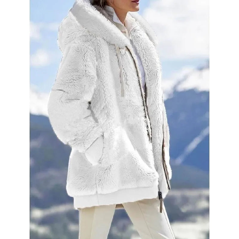 White women's oversized fleece zip-up coat by Corporación Turística, featuring a cozy, relaxed fit and front zipper closure.