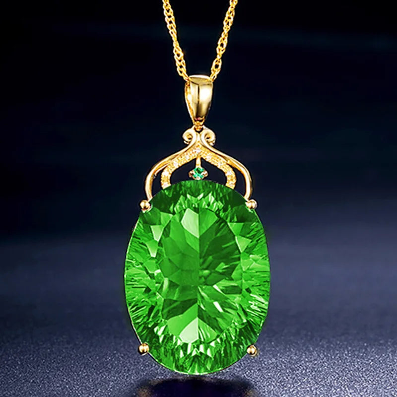 Swiss Queen water drop-style collar necklace in vibrant green, featuring gold-toned links and elegant design by Corporación Turística.