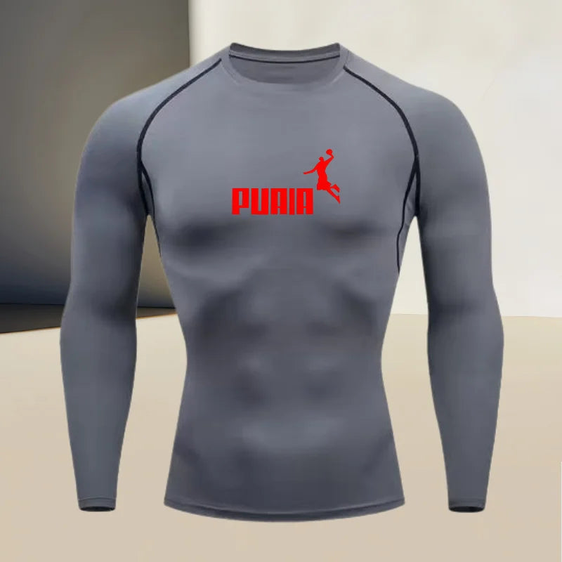 Close-up of Corporación Turística's fitted long-sleeve sports T-shirt with round neck, shown in XXL size.