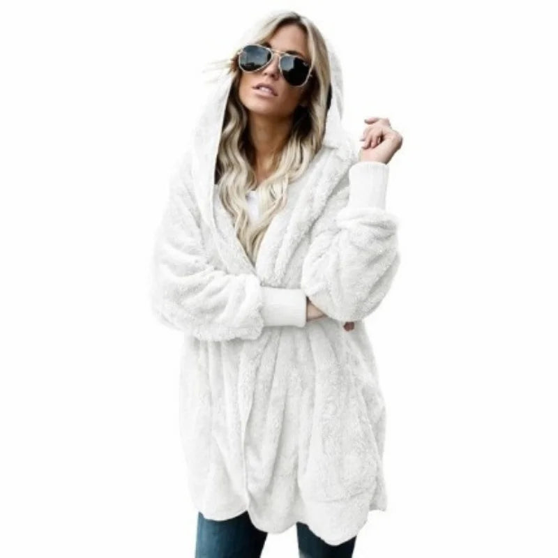 Long pink wool cardigan sweater in 12 colors from Corporación Turística, featuring a cozy, oversized design for autumn.