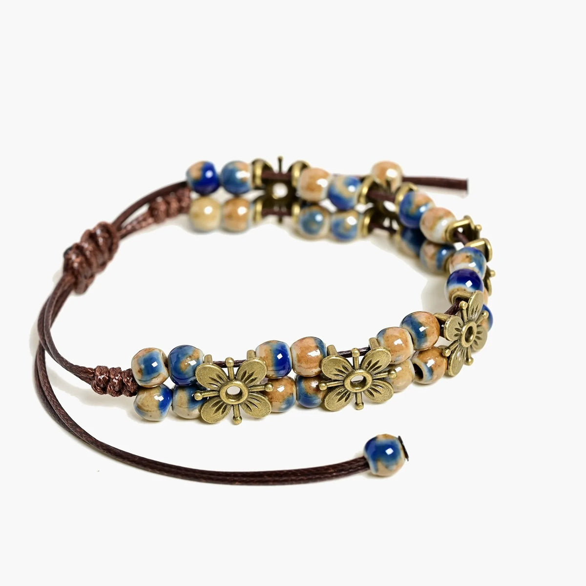 Handmade ceramic bead chain bracelet with intricate details, featuring a stylish design and natural craftsmanship.