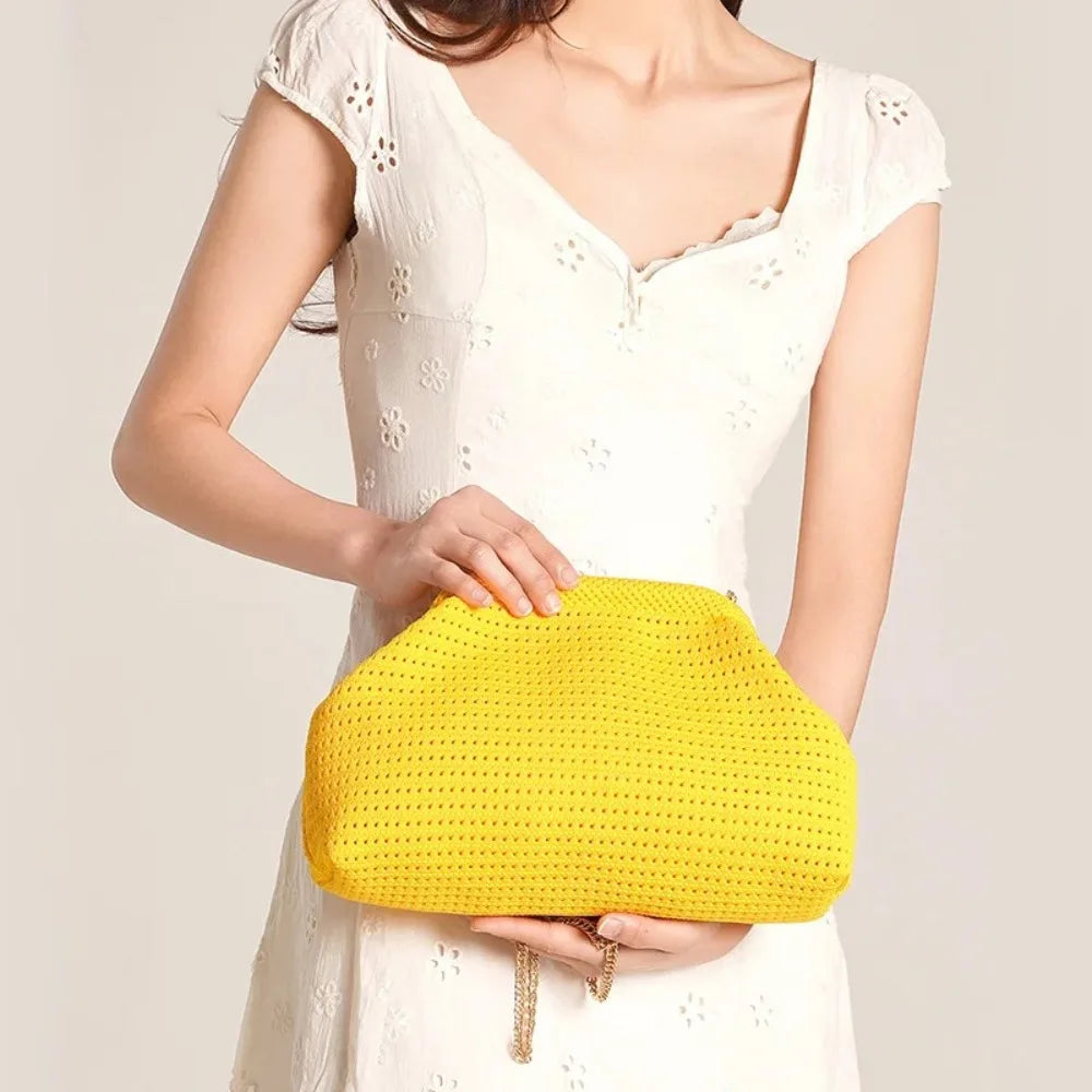 Yellow women's beach clutch bag by Corporación Turística, sleek and simple design for summer outings.