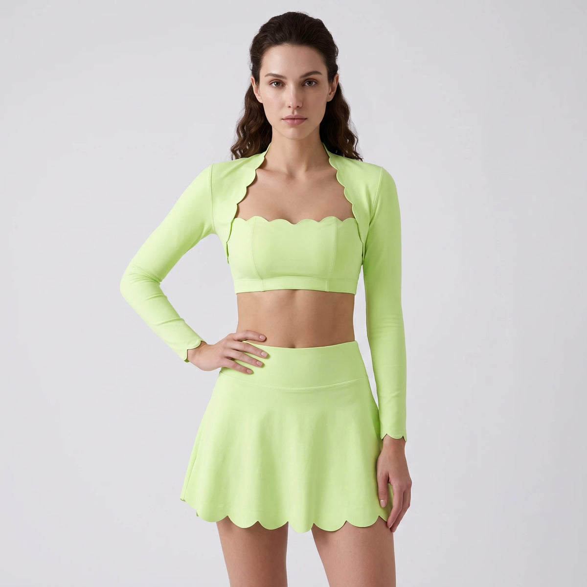 Yellow women's sports set from Corporación Turística, Serie Scallop Petal, includes sports bra and matching leggings.