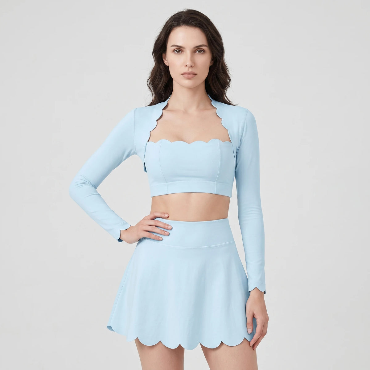 Yellow women's sports set from Corporación Turística, Serie Scallop Petal, includes sports bra and leggings, stylish athletic wear.