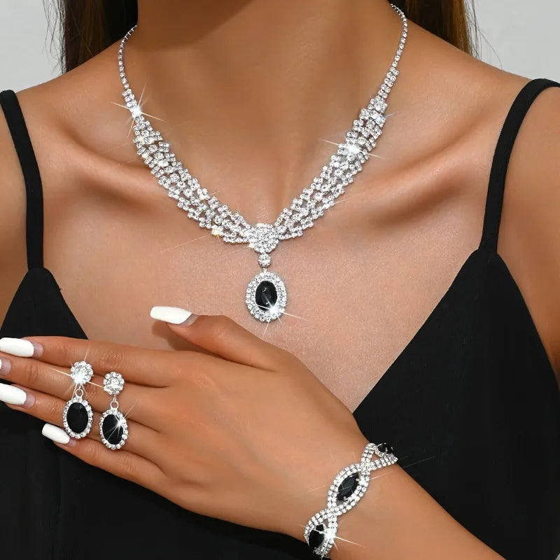 Elegant bridal jewelry set with a necklace and earrings by Corporación Turística, featuring intricate design and sparkling details.