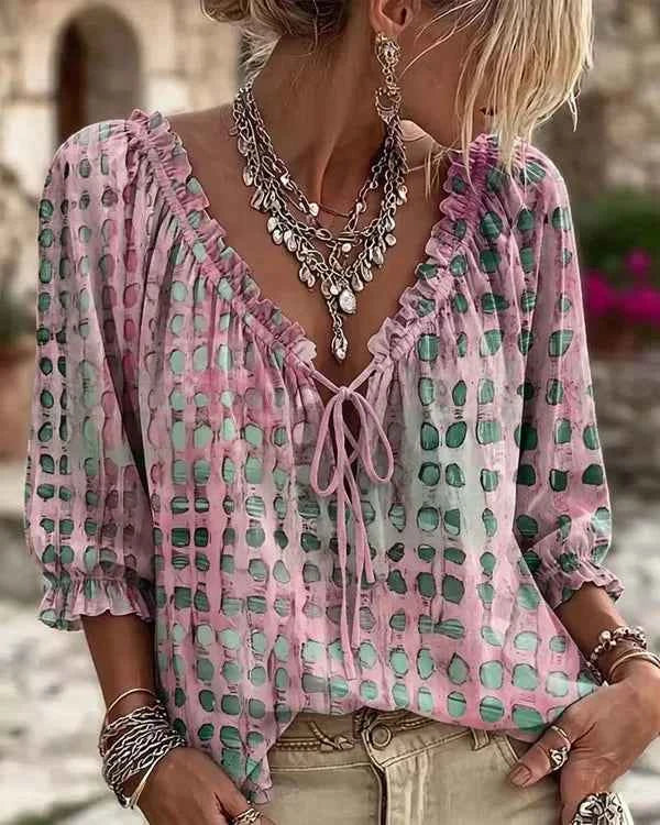 Bohemian style summer blouse for women with loose fit and floral print, featuring a V-neck, from Corporación Turística.
