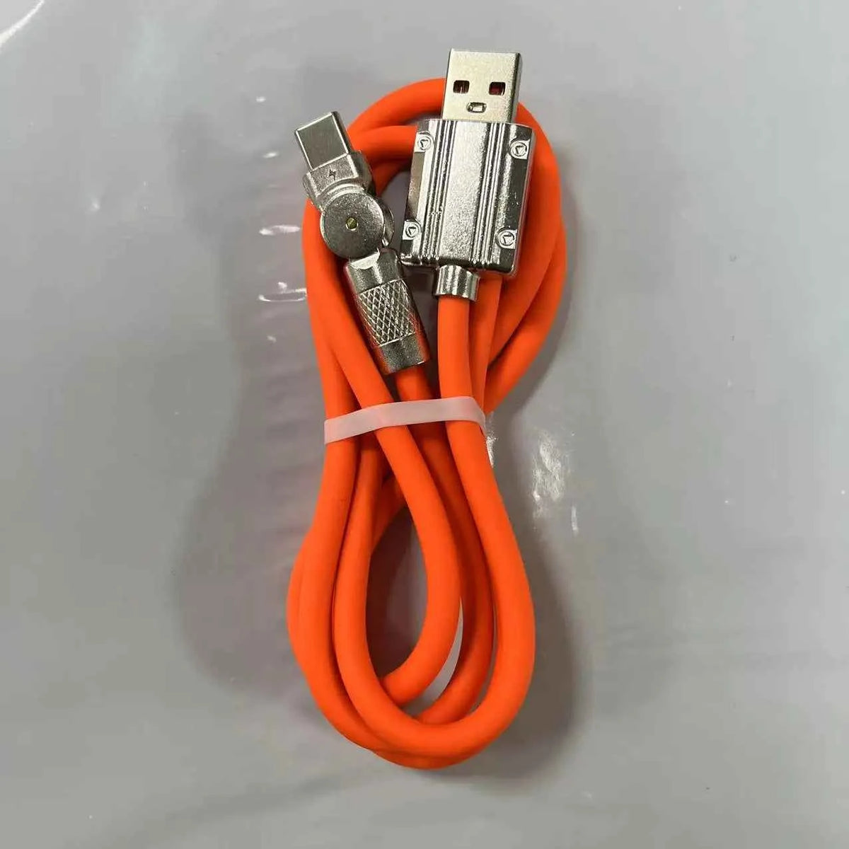 Orange DAINU USB C fast charging cable, 1 meter, 120W, 7A, 180° rotation, compatible with Xiaomi gaming devices.