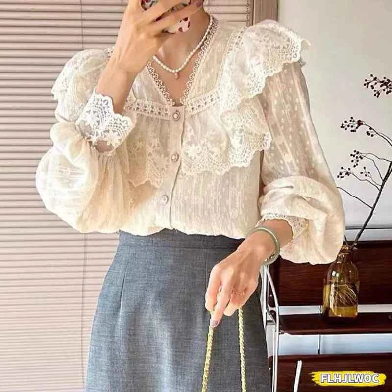 Elegant white blouse with ruffles and long sleeves for women, perfect for office wear, by FLHJLWOC.