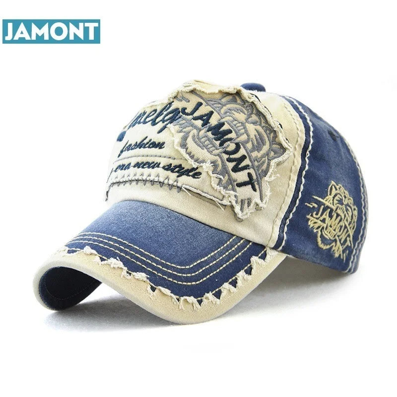 Unisex blue cotton baseball cap by JAMONT with embroidered design, adjustable strap, and classic fit.