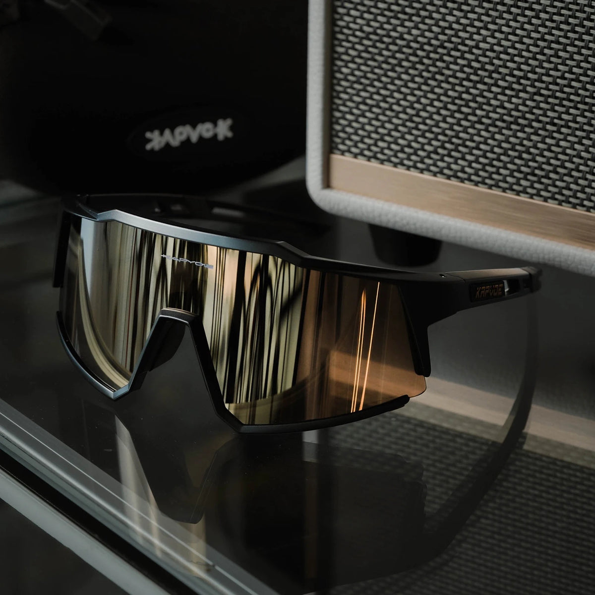 Kapvoe polarized UV400 cycling glasses for men and women, sporty MTB eyewear with four-lens design and durable frame.