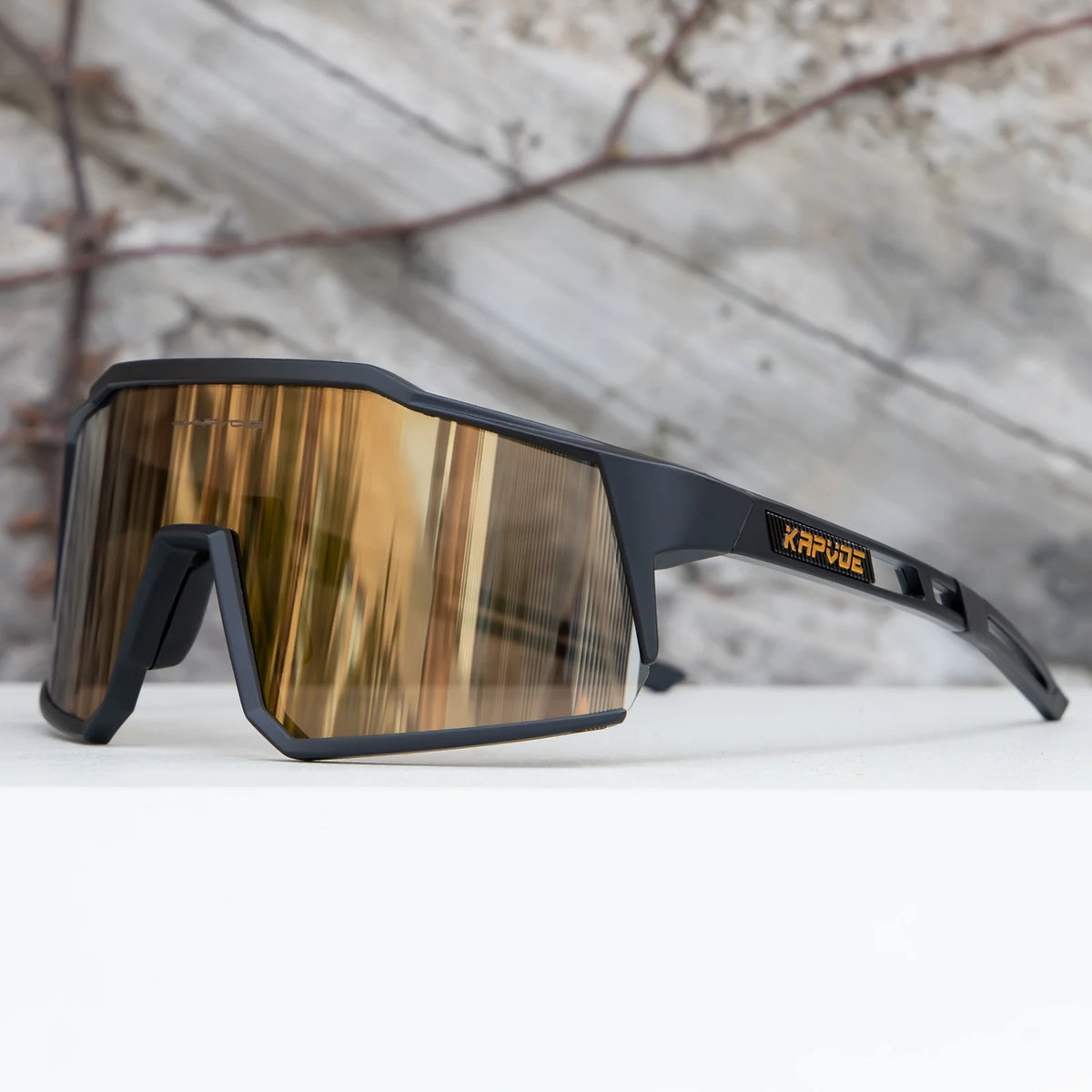 Kapvoe polarized cycling glasses with UV400 protection, suitable for MTB riding for men and women, featuring sporty design and lenses.