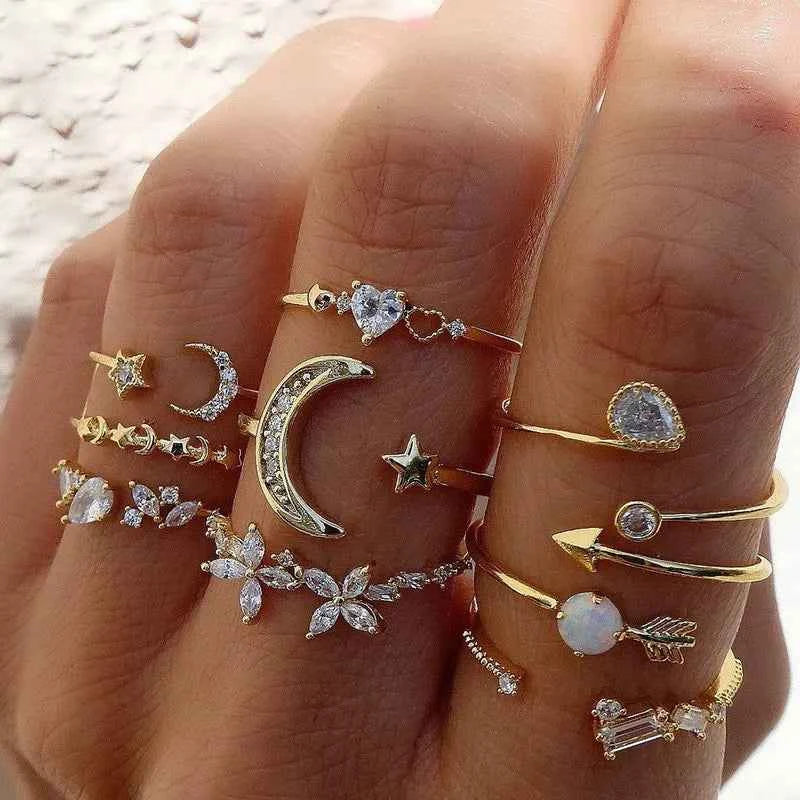 Set of bohemian Modyle 18K gold rings with circon stones, featuring multiple stacked ring styles for women’s jewelry and wedding gift.