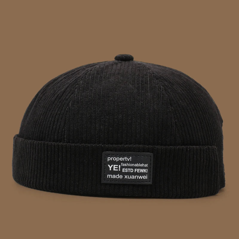 Unisex Yuppie fleece-lined corduroy hat with colorful stripe pattern, ideal for autumn and winter weather.