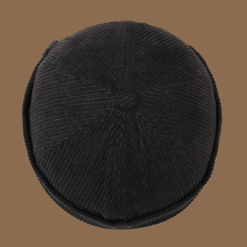 Unisex Yuppie fleece-lined corduroy beanie hat with striped pattern for autumn and winter warmth.