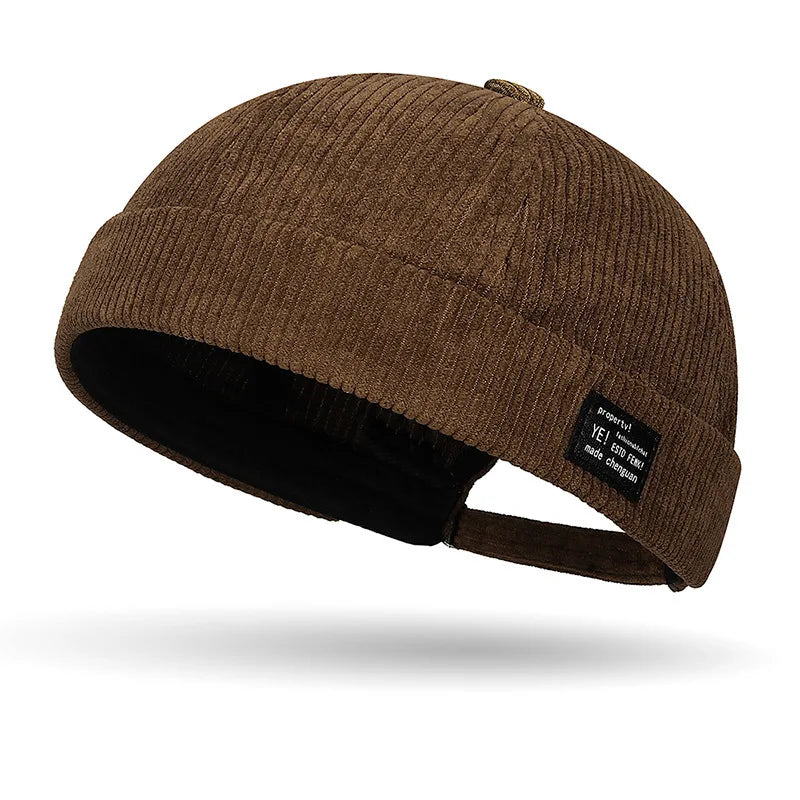 Unisex yellow corduroy winter and autumn hat with colorful stripe pattern, warm and cozy Gorro Pana Yuppie for cold weather.