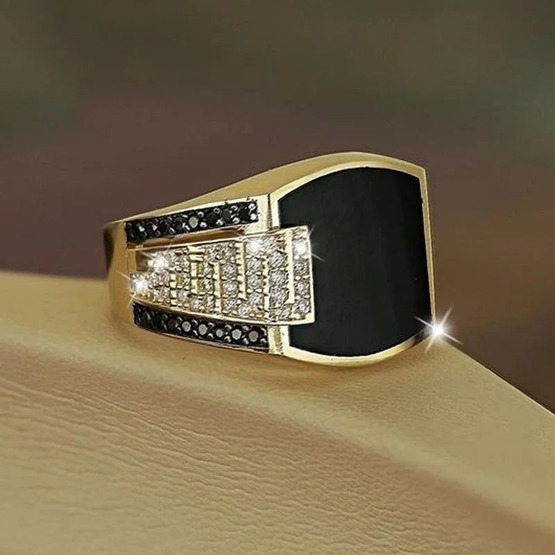 Gold men's punk ring with black stone and cubic zirconia, ideal for wedding or engagement jewelry in men's jewelry.