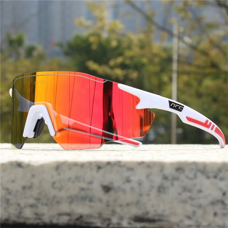 NRC UV400 TR90 cycling sunglasses with sporty design, suitable for MTB, fishing, and hiking, featuring black frames and tinted lenses.