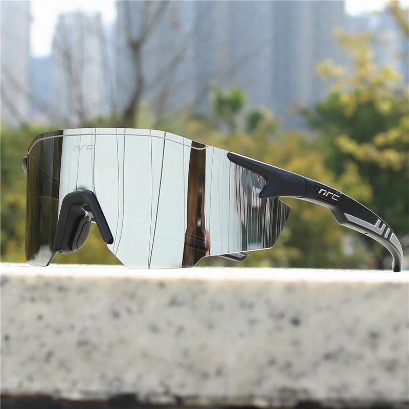 NRC UV400 TR90 sports cycling sunglasses with black frame and tinted lenses, suitable for MTB, fishing, and hiking activities.