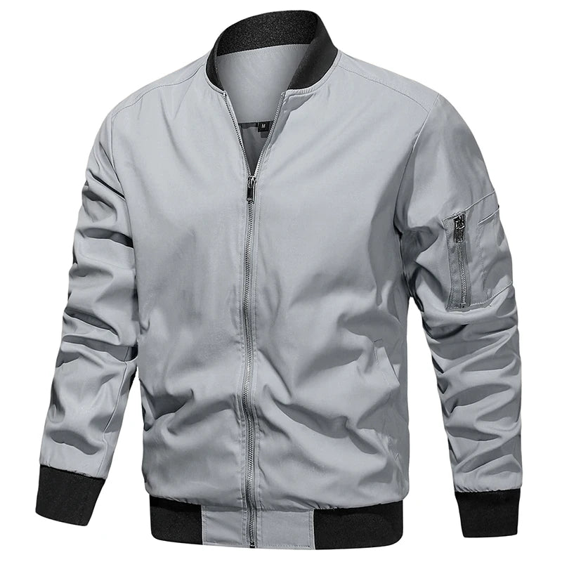 ReFire Gear men's khaki bomber jacket, lightweight and modern, ideal for spring and fall seasons, displayed on a hanger.